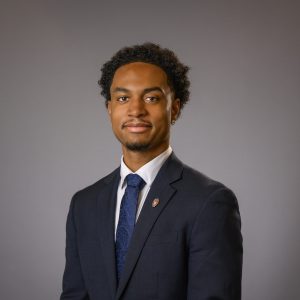Studio headshot of Christopher Johns.